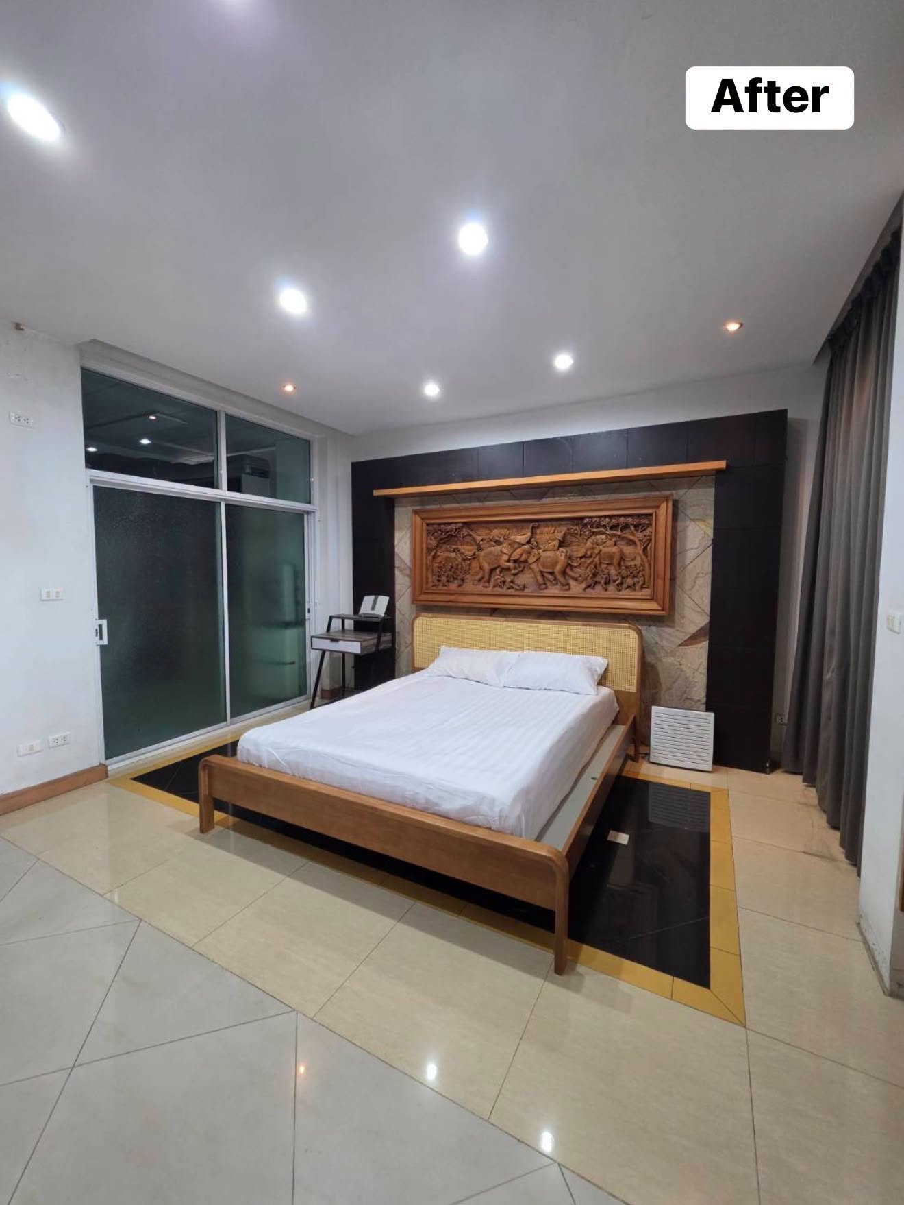 ห้องนอนหลังปรับจัดพื้นที่ มีเตียงนอนและทางเดินโล่ง